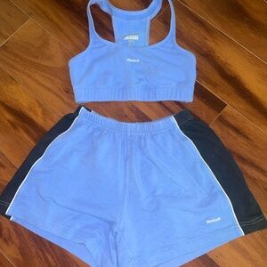 Reebok Purple Sports Bra and Black-Trim Shorts